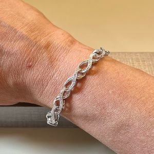 1/4 CT Total Weight Diamond Infinity Bracelet